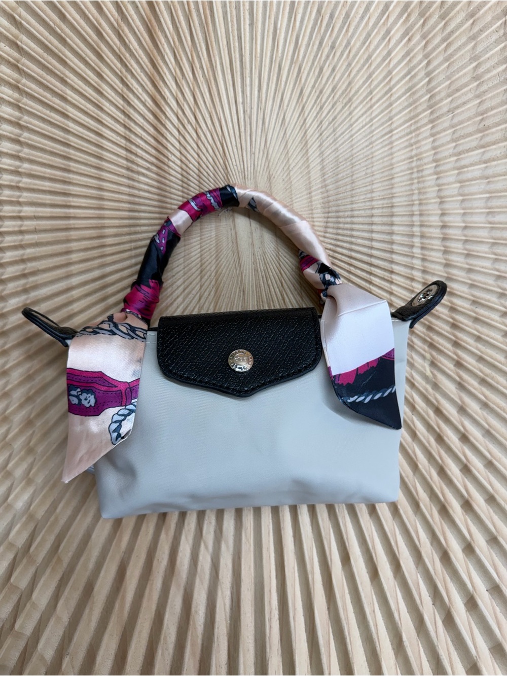 Small Top-Handle Bag in Cream with Black Flap and Pink-Accented Scarf